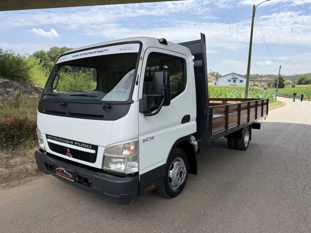Mitsubishi FUSO CANTER 3C13 6 VEL LONGA 5,75M 2009 - 23900 EUR, 189000 km - AUTO.MOTO.pt - 189000km - foto 1 de 23