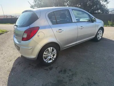 Opel Corsa 2010 - 5100 EUR, 183000 km - AUTO.MOTO.pt - 183000km - foto 4 de 23