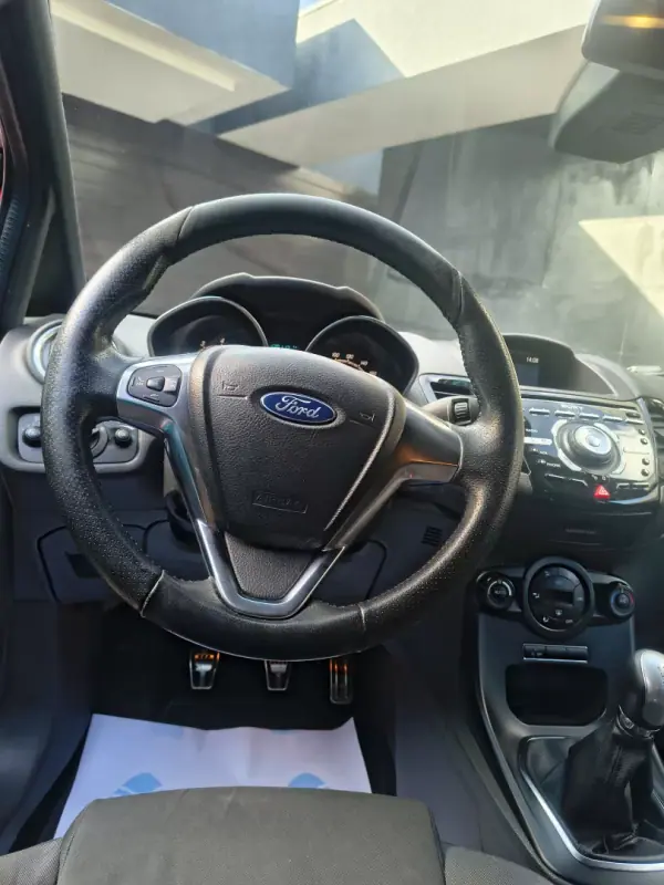 Ford Fiesta 2017 - 10750 EUR, 128000 km - AUTO.MOTO.pt - 128000km - foto 12 de 23