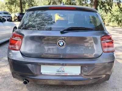 BMW 118 2015 - 16990 EUR, 128541 km - AUTO.MOTO.pt - 128541km - foto 3 de 4