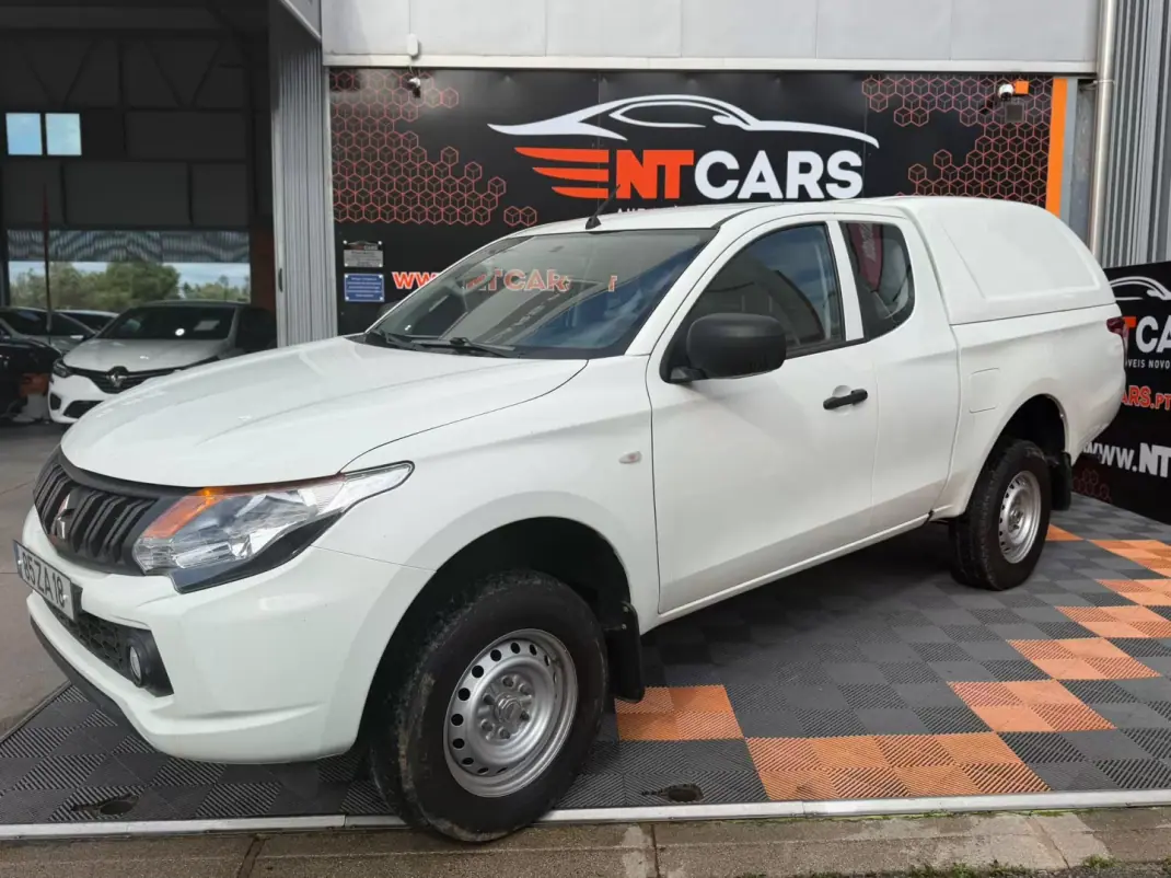 Mitsubishi L200 2.4 DI-D CE 3LUG Club Invite 4WD 2019 - 22900 EUR, 126907 km - AUTO.MOTO.pt - 126907km - foto 1 de 18