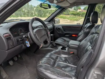 Jeep Grand Cherokee 1999 - 9500 EUR, 300000 km - AUTO.MOTO.pt - 300000km - foto 13 de 14