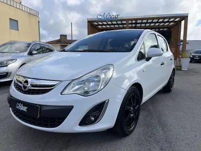 Opel Corsa 2011 - 6450 EUR, 117000 km - AUTO.MOTO.pt - 117000km - foto 9 de 50