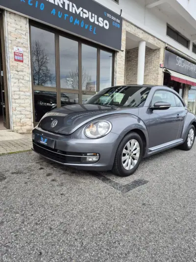Volkswagen New Beetle 2013 - 13950 EUR, 142000 km - AUTO.MOTO.pt - 142000km - foto 3 de 34