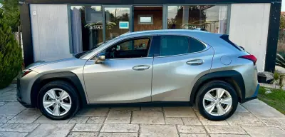 Lexus UX 250h 2021 - 31990 EUR, 54656 km - AUTO.MOTO.pt - 54656km - foto 5 de 16