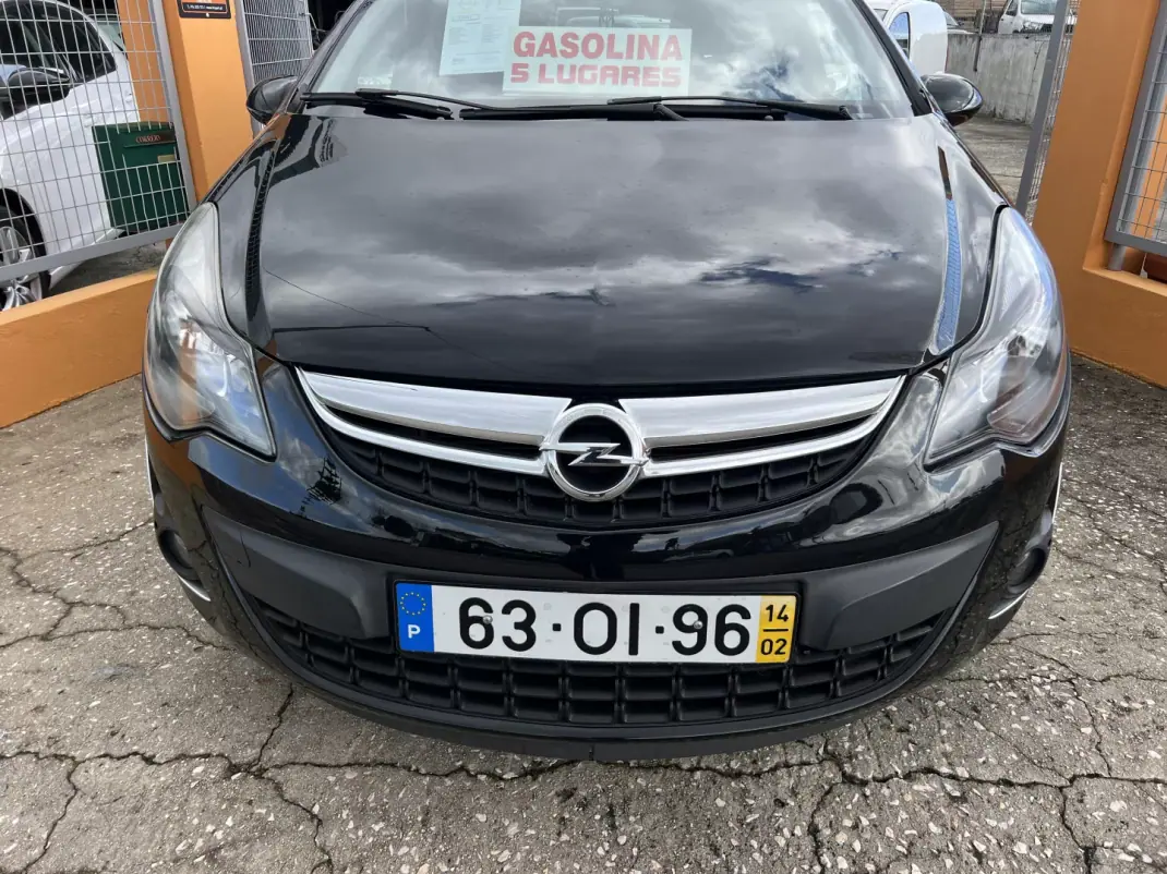 Opel Corsa 2014 - 6450 EUR, 136121 km - AUTO.MOTO.pt - 136121km - foto 6 de 23