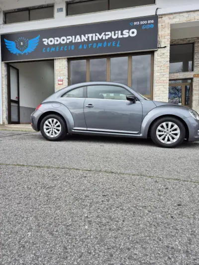 Volkswagen New Beetle 2013 - 13950 EUR, 142000 km - AUTO.MOTO.pt - 142000km - foto 6 de 34