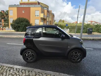 Smart Fortwo Cabrio 2015 - 12480 EUR, 70000 km - AUTO.MOTO.pt - 70000km - foto 6 de 9