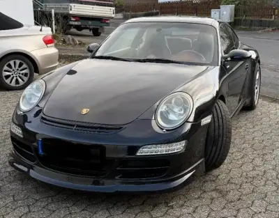 Porsche 911 2007 - 57000 EUR, 127289 km - 127289km - foto 28 de 37