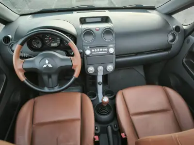 Mitsubishi Colt 2007 - 8950 EUR, 22671 km - AUTO.MOTO.pt - 22671km - foto 25 de 56