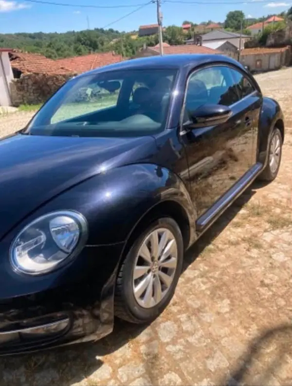 Volkswagen New Beetle 2012 - 8700 EUR, 190000 km - AUTO.MOTO.pt - 190000km - foto 4 de 6