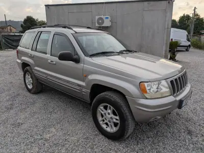 Jeep Grand Cherokee 1999 - 9500 EUR, 300000 km - AUTO.MOTO.pt - 300000km - foto 2 de 14
