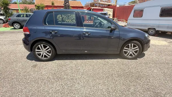 Volkswagen Golf 2010 - 8950 EUR, 141014 km - AUTO.MOTO.pt - 141014km - foto 12 de 43