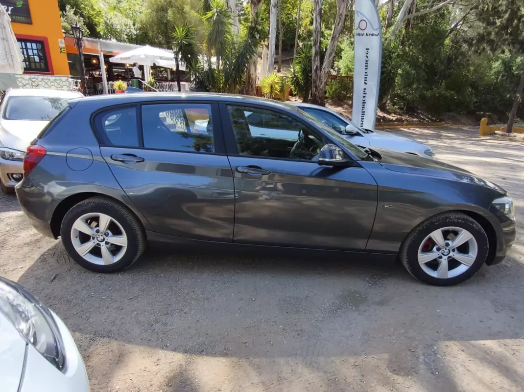 BMW 118 2015 - 16990 EUR, 128541 km - 128541km - foto 2 de 4