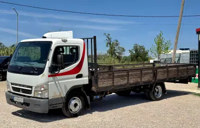 Mitsubishi Canter 3.0 Di-D Tribasculante 2010 - 11940 EUR, 500000 km - AUTO.MOTO.pt - 500000km - foto 3 de 14