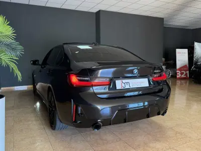 BMW 330e 2023 — foto 4 de 26