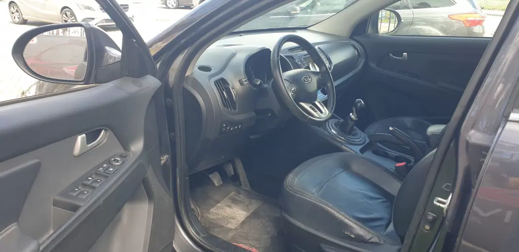 Kia Sportage 2012 - 10750 EUR, 181000 km - AUTO.MOTO.pt - 181000km - foto 14 de 15