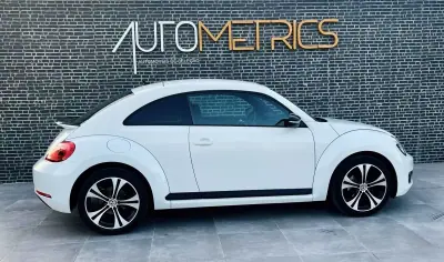 Volkswagen New Beetle 2012 - 10900 EUR, 229000 km - AUTO.MOTO.pt - 229000km - foto 9 de 14