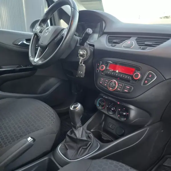 Opel Corsa 2017 - 9750 EUR, 130248 km - AUTO.MOTO.pt - 130248km - foto 13 de 19