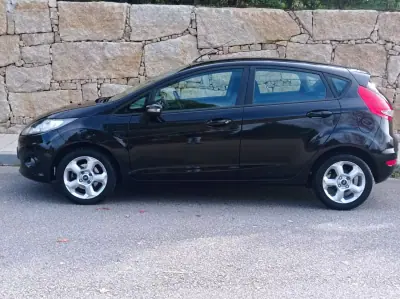 Ford Fiesta 2010 - 6490 EUR, 193000 km - AUTO.MOTO.pt - 193000km - foto 6 de 11