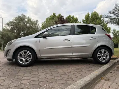 Opel Corsa 2013 - 7465 EUR, 99000 km - AUTO.MOTO.pt - 99000km - foto 5 de 41
