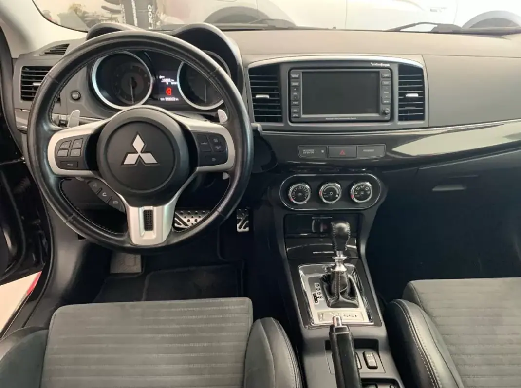 Mitsubishi Lancer 2011 - 54990 EUR, 90000 km - 90000km - foto 3 de 19