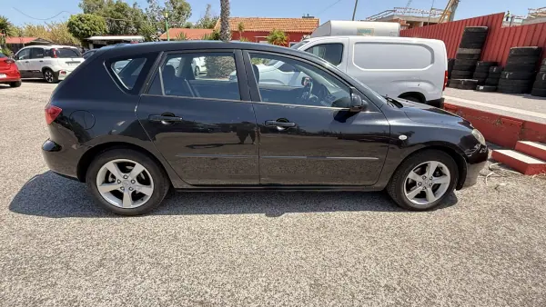 Mazda 3 2005 - 3500 EUR, 168000 km - AUTO.MOTO.pt - 168000km - foto 4 de 49