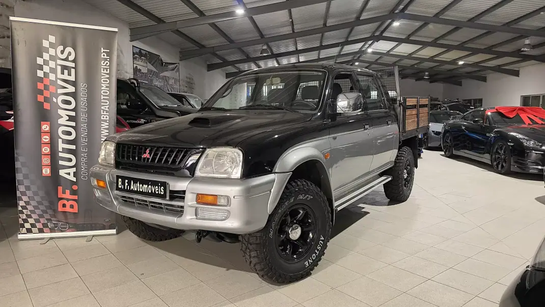 Mitsubishi L200 1998 - 13900 EUR, 279297 km - AUTO.MOTO.pt - 279297km - foto 1 de 36