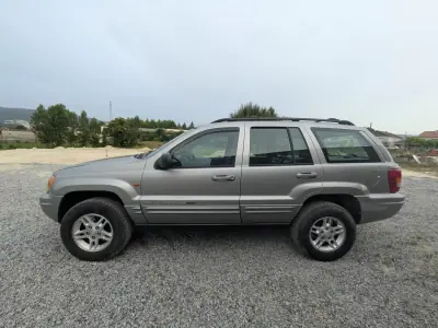 Jeep Grand Cherokee 1999 - 9500 EUR, 300000 km - AUTO.MOTO.pt - 300000km - foto 3 de 14