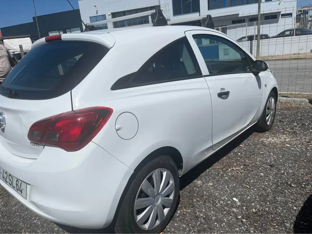 Opel Corsa E Van 2017 - 4650 EUR, 225590 km - AUTO.MOTO.pt - 225590km - foto 11 de 15