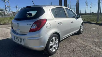 Opel Corsa 2013 - 4650 EUR, 212000 km - AUTO.MOTO.pt - 212000km - foto 6 de 13