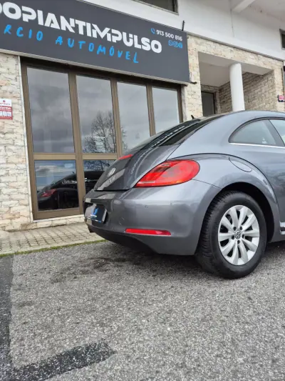 Volkswagen New Beetle 2013 - 13950 EUR, 142000 km - AUTO.MOTO.pt - 142000km - foto 7 de 34