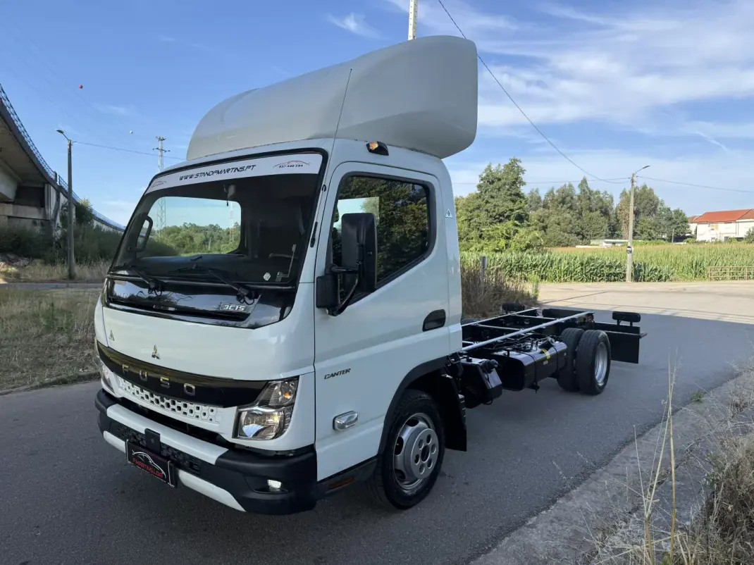 Mitsubishi FUSO CANTER 3C15 AC/ABS DUONIC PLATAFORMA DHOLLANDIA 2022 - 28900 EUR, 190000 km - AUTO.MOTO.pt - 190000km - foto 1 de 26