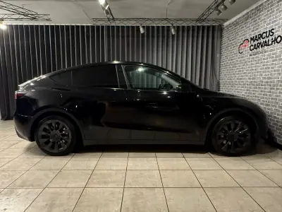 Tesla Model Y 2022 - 34900 EUR, 77000 km - AUTO.MOTO.pt - 77000km - foto 6 de 14