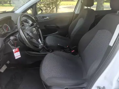 Opel Corsa 2017 - 12900 EUR, 58750 km - AUTO.MOTO.pt - 58750km - foto 13 de 34
