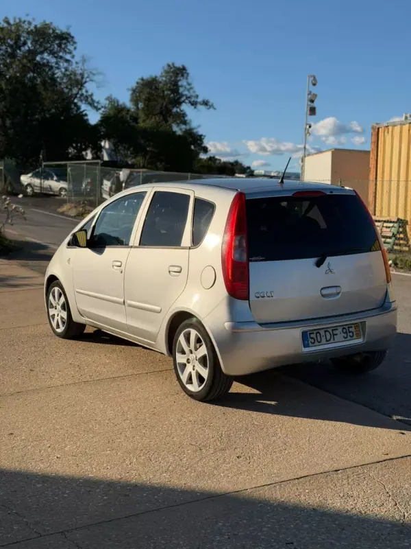 Mitsubishi Colt 2007 - 5900 EUR, 196804 km - AUTO.MOTO.pt - 196804km - foto 3 de 7
