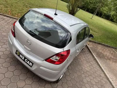 Opel Corsa 2013 - 7465 EUR, 99000 km - AUTO.MOTO.pt - 99000km - foto 12 de 41