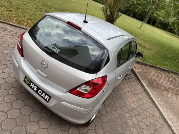 Opel Corsa 2013 - 7465 EUR, 99000 km - AUTO.MOTO.pt - 99000km - foto 12 de 41