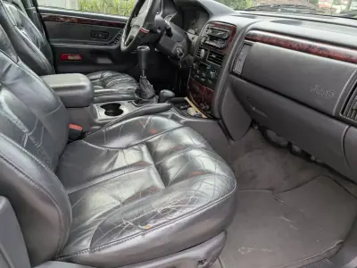 Jeep Grand Cherokee 1999 - 9500 EUR, 300000 km - AUTO.MOTO.pt - 300000km - foto 12 de 14