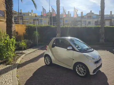 Smart Fortwo Cabrio 2013 - 7480 EUR, 90000 km - AUTO.MOTO.pt - 90000km - foto 7 de 8