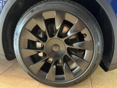 Tesla Model Y 2022 - 37990 EUR, 52574 km - AUTO.MOTO.pt - 52574km - foto 6 de 15