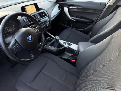 BMW 114 2015 - 11900 EUR, 185938 km - AUTO.MOTO.pt - 185938km - foto 5 de 26
