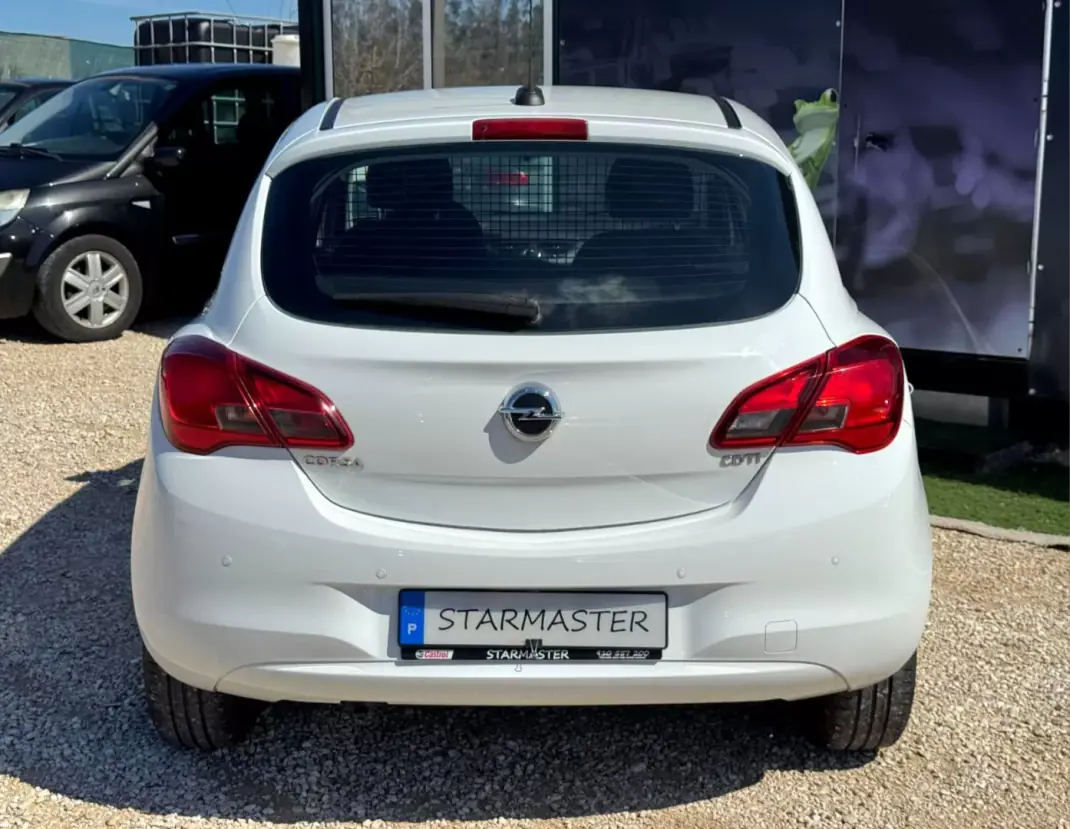 Opel Corsa 2018 - 6450 EUR, 214881 km - AUTO.MOTO.pt - 214881km - foto 7 de 15