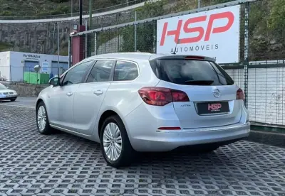 Opel Astra Sports Tourer 2013 — photo 4 of 16