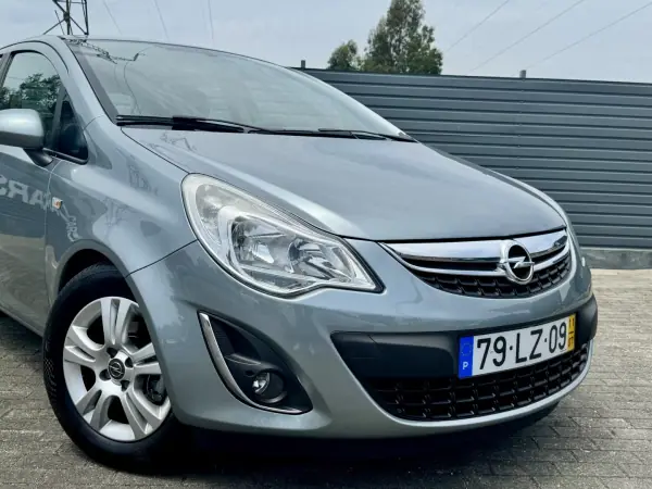 Opel Corsa 2011 - 6950 EUR, 212000 km - AUTO.MOTO.pt - 212000km - foto 4 de 19