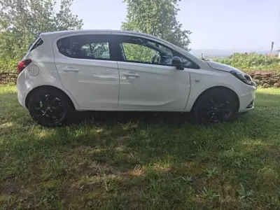 Opel Corsa 2017 - 12900 EUR, 58750 km - AUTO.MOTO.pt - 58750km - foto 2 de 34