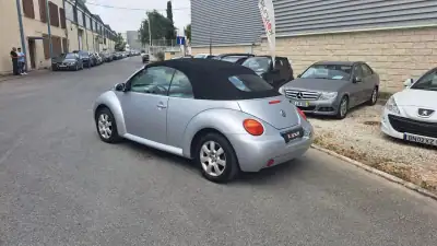 Volkswagen New Beetle Cabriolet 2004 - 9890 EUR, 127830 km - AUTO.MOTO.pt - 127830km - foto 28 de 48