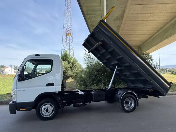 Mitsubishi FUSO CANTER 3C13 BASCULANTE 2010 - 28990 EUR, 116000 km - AUTO.MOTO.pt - 116000km - foto 4 de 23