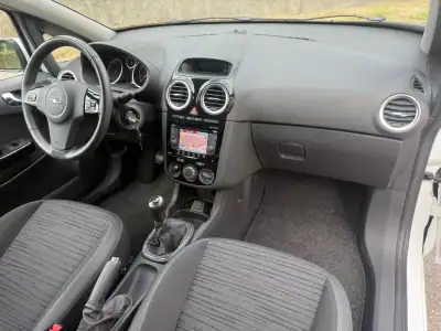 Opel Corsa 2014 - 6450 EUR, 161000 km - AUTO.MOTO.pt - 161000km - foto 13 de 22