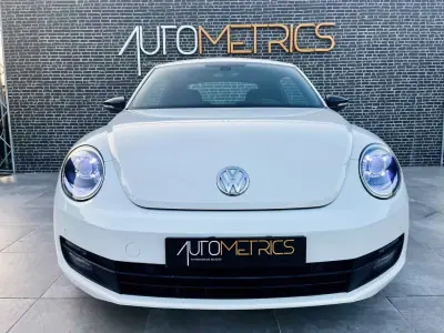Volkswagen New Beetle 2012 - 10900 EUR, 229000 km - AUTO.MOTO.pt - 229000km - foto 8 de 14